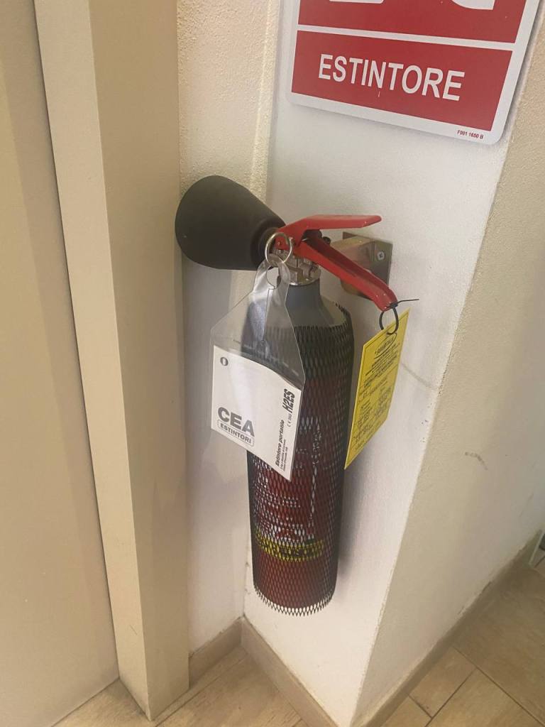 extinguisher with a net looking like some sexy tight
