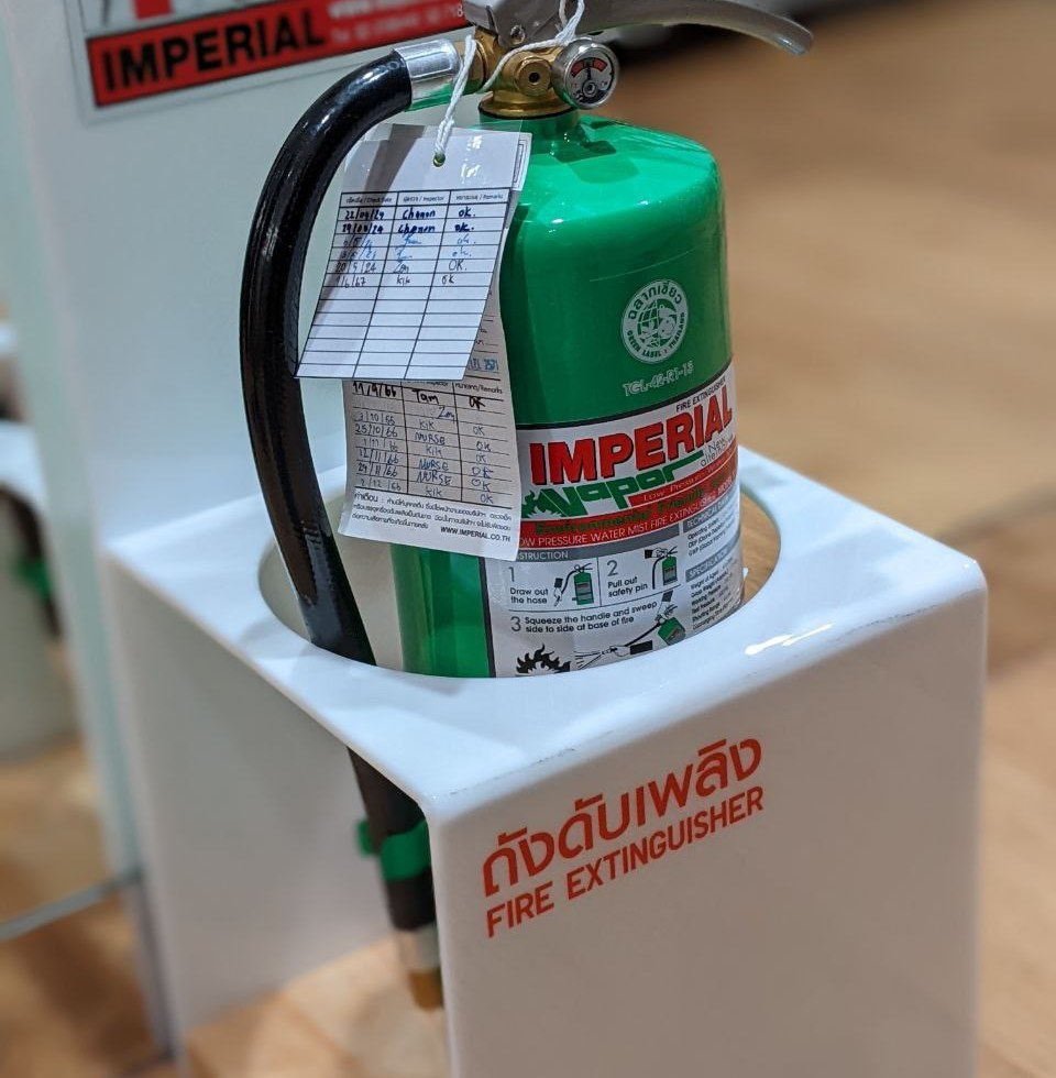 extinguisher with a card looking like a borrowed book at a library