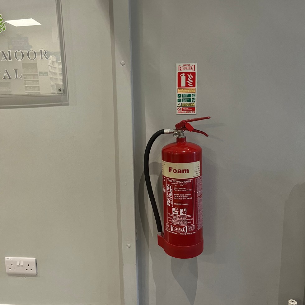 extinguisher mounted on a wall